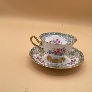 This is a Shelley fine bone China, teacup, and saucer in the Georgian pattern